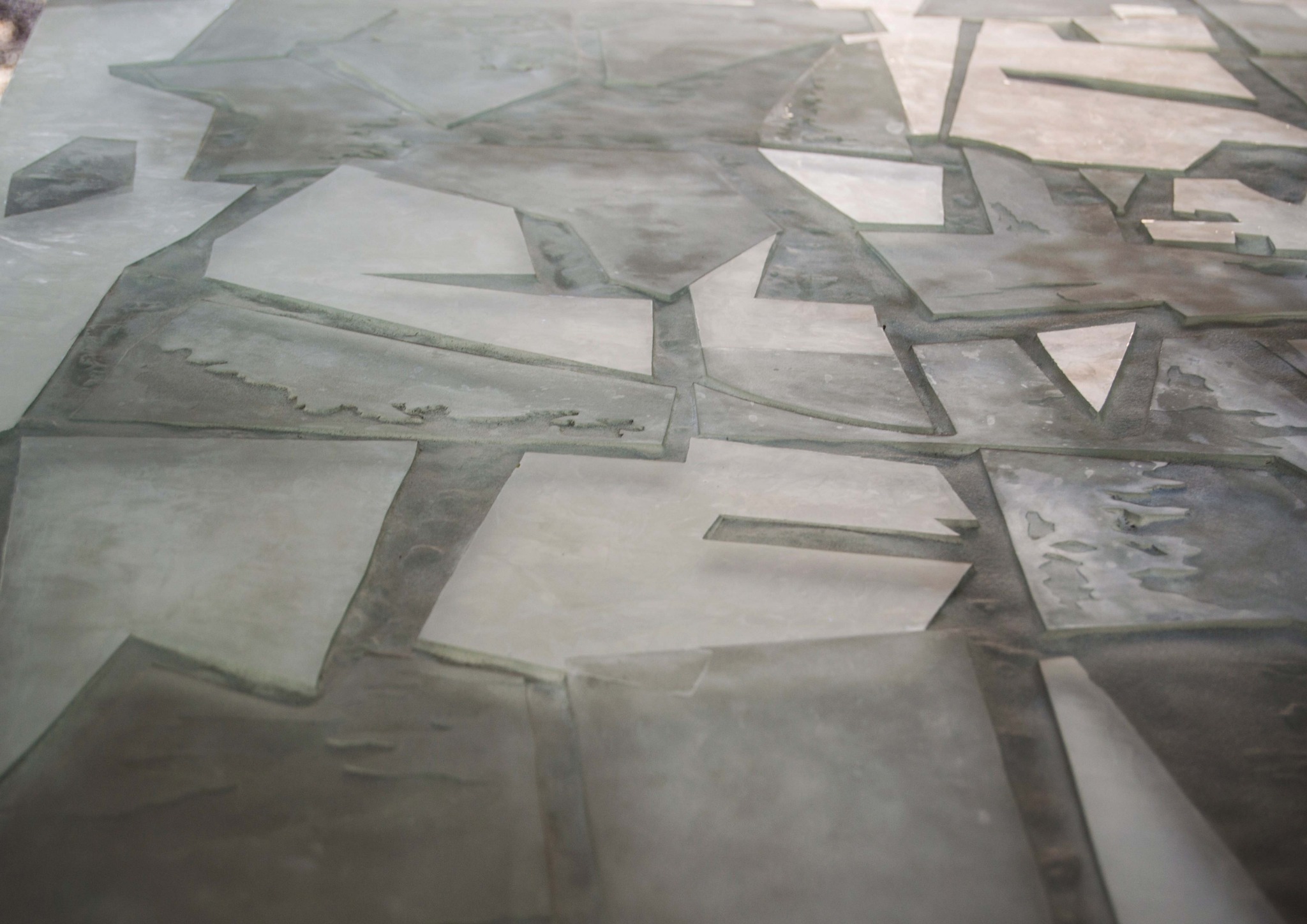 Detail of a geometric glass bas-relief